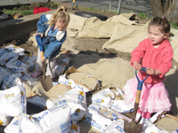 A parent and child do an activity together